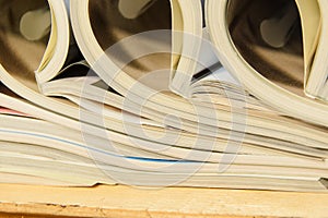 side view of a stack of magazines