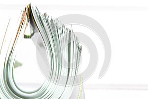 side view of a stack of magazines