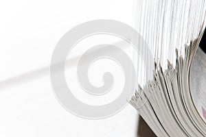 side view of a stack of magazines