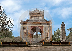 Side view of the Stele Pavilion and one obelisk in Tu Duc Royal Tomb, Hue, Vietnam