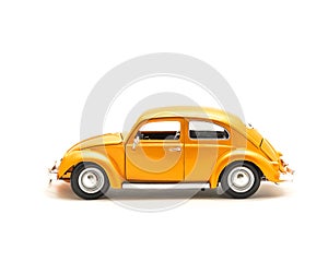 Side view studio shot small orange toy car isolated on white