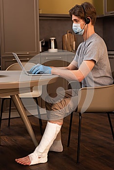 Side view of teleworker in medical photo