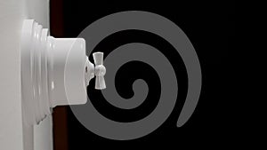 SIDE VIEW: Toggle Switch On The Wall