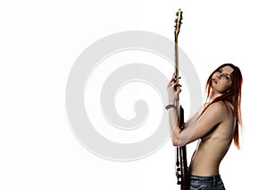 Side view of topless rock woman holding electric guitar on a white background. copyspace for your text