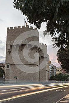 Side view of the Torres de Serrano in Valencia, Spain. To become night