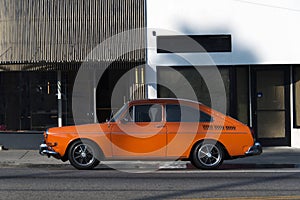 Side view of a vintage classic car in the street