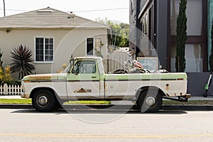 Side view of a vintage classic car van in the street