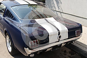 Side view of a vintage classic car van in the street