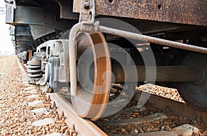 Side view of wheel wagon of old rusty freight train