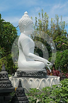 Side View Of White Buddha Statue At Brahmavihara Arama, North Bali, Indonesia