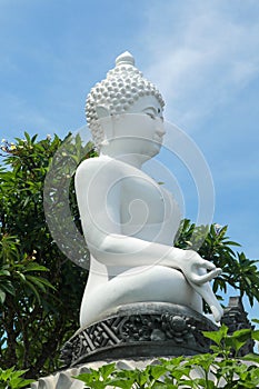 Side View Of White Buddha Statue At Brahmavihara Arama, North Bali, Indonesia