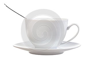 Side view of white cup with spoon and saucer