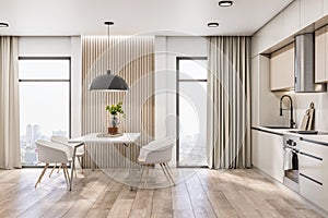 Side view on white dining table and chairs in spacious stylish kitchen room with wooden floor and wall part, great city view from