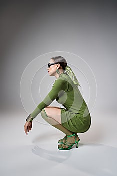 Side view of woman in green