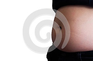 Side view of woman hand catching fat body belly paunch , diabetic risk factor