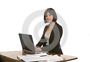 Side view of a woman at her desk