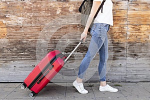 Side view woman with her luggage . High quality and resolution beautiful photo concept