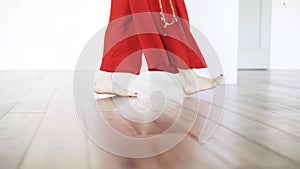 Side view of woman s legs in yoga pants walking