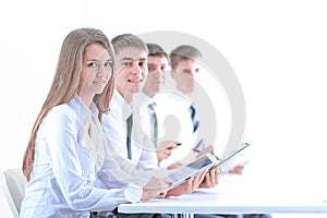 Side view.young business team sitting at the Desk