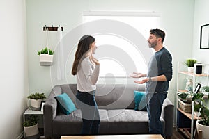 Side view of a young couple having relationship problems