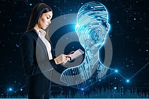 Side view of young european businesswoman using tablet with abstract digital fingerprint man or person silhouette on blurry blue