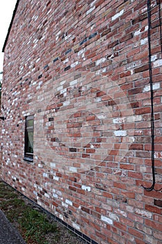 Side wall of modern house with different coloured bricks