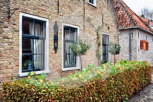 The side wall with window of a house in Bourtange, a Dutch fortified village in the province of Groningen