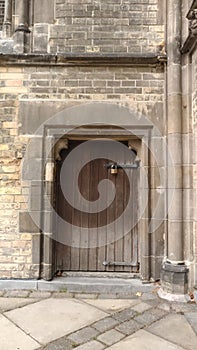 Side wooden door in St.  Nikolai Memorial in Hamburg