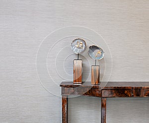 Sideboard in front of a grey wall