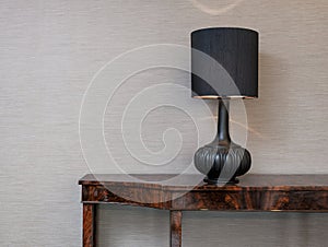 Sideboard with table lamp