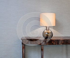 Sideboard with table lamp