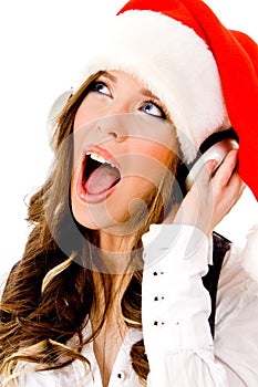 Sidepose of christmas woman listening music
