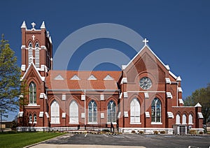 Sideview of the historic Saint Patrick Catholic Parish Church in Denison, Texas.