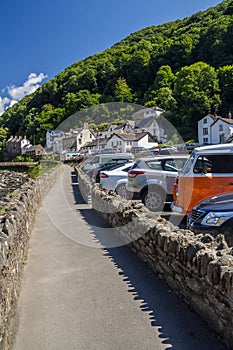 The sidewalk along the river and parking in Lynmouth