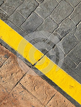 Sidewalk background - yellow line on road street border