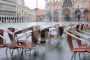 chairs submerged on Venice Square during the flood