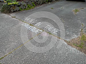 Sidewalk Chalk Writing on Driveway Hang in There Seattle