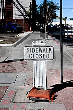 Sidewalk closed signs
