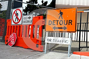 Sidewalk Closed signs for works. Stop and Detour signs