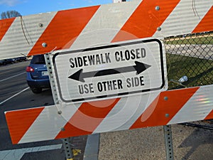 Sidewalk closed use other side sign