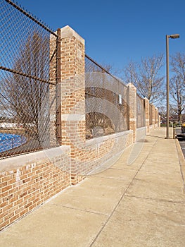 Sidewalk by fence