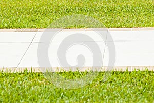 Sidewalk in the grass