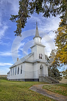 Sidewalk leads to small country church