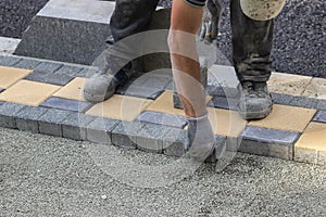 Sidewalk paver installation in progress 3