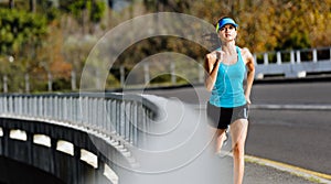 Sidewalk running woman