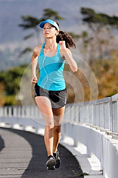 Sidewalk running woman