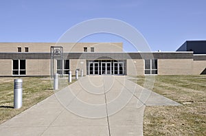 Sidewalk by school building photo