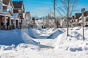 Sidewalks near houses cleared of snow by residents