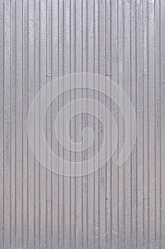 Siding, metal panels texture closeup in the daytime outdoors