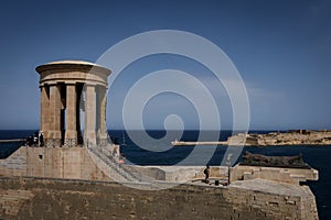 Siege Bell War Memorial on the sea coast in Valletta, Malta.